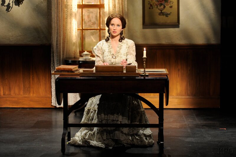 woman at a writing desk
