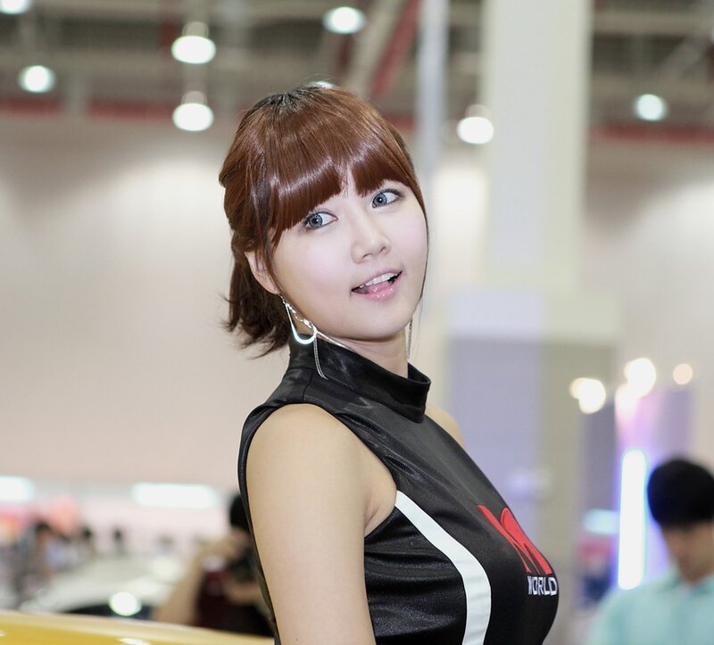 woman at an auto show