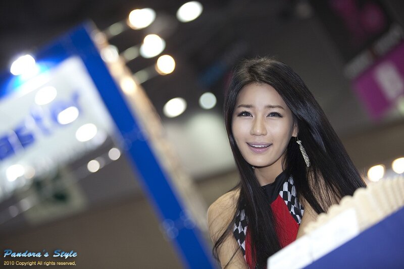woman at an auto show