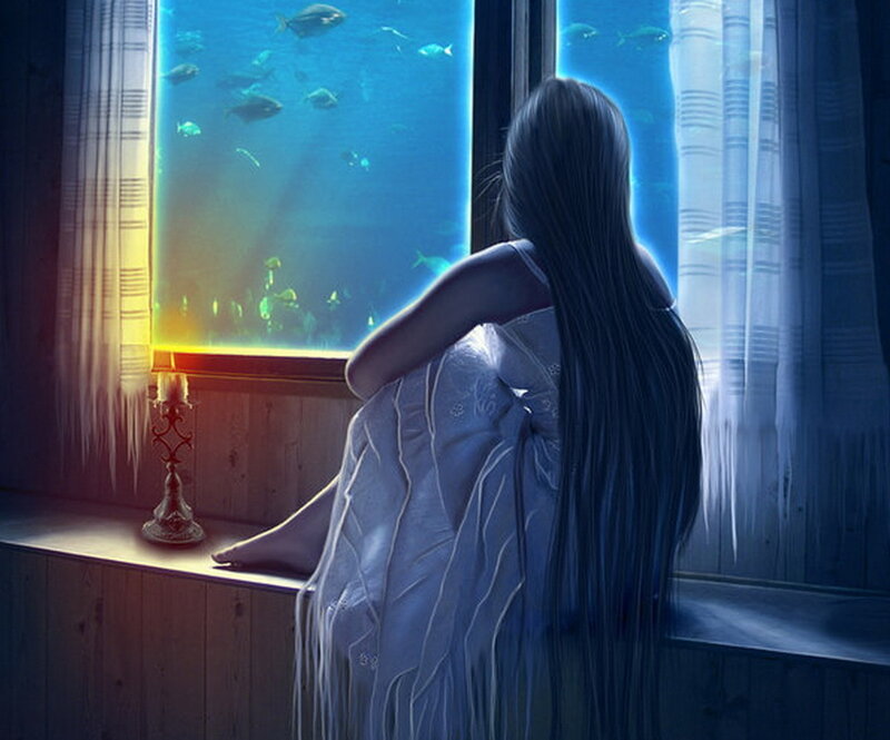 woman at aquarium window