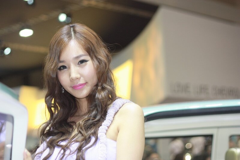 woman at auto show