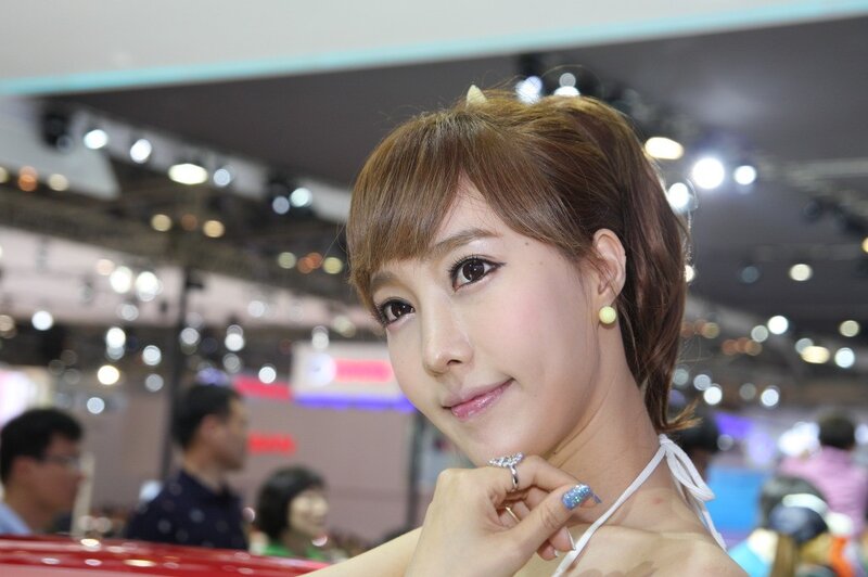 woman at auto show event