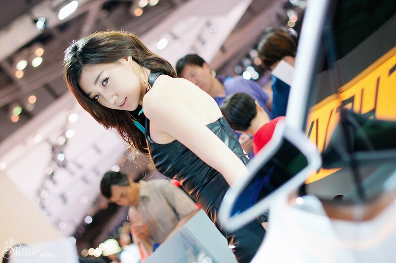 Woman at auto show event