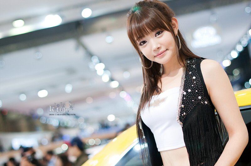 woman at auto show event