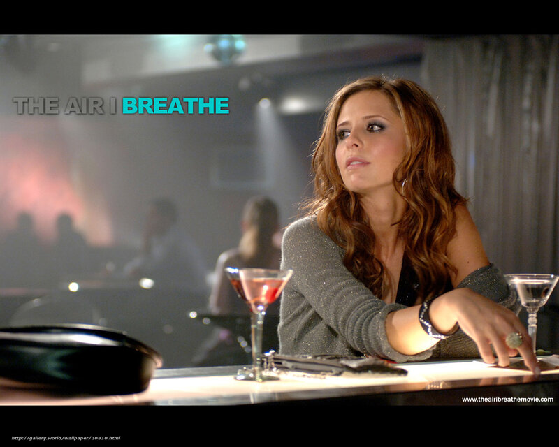 woman at bar with drinks