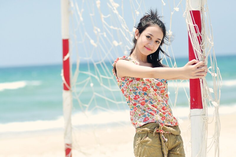 Woman at beach with net