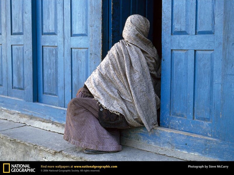 woman at blue door