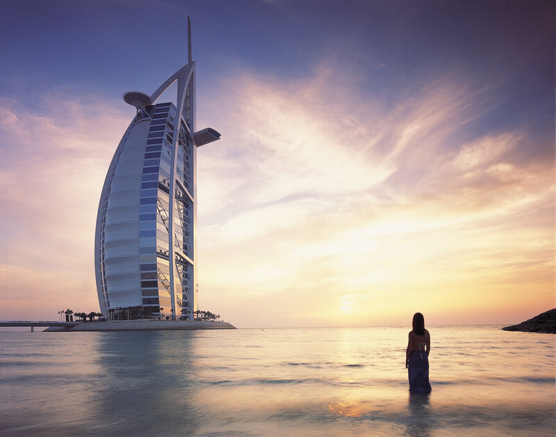 woman at burj al arab sunset