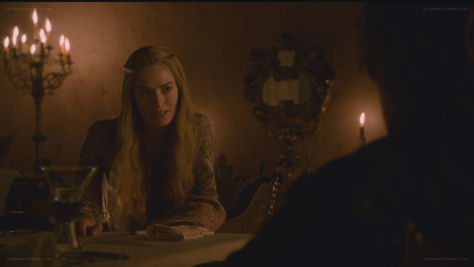 woman at candlelit table