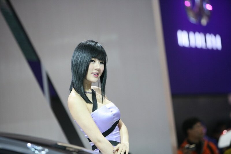 Woman at car show event