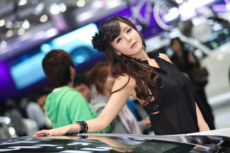Woman at car show event