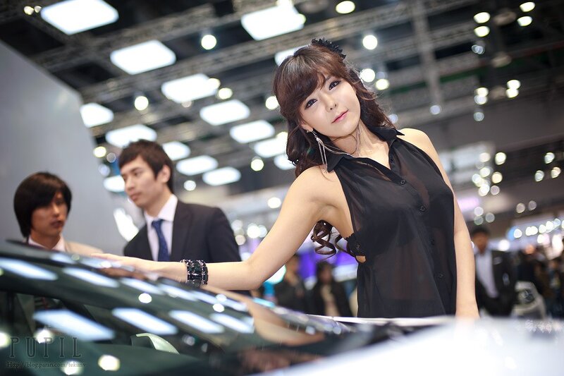 Woman at car show event