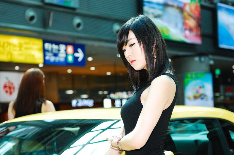 Woman at car show event