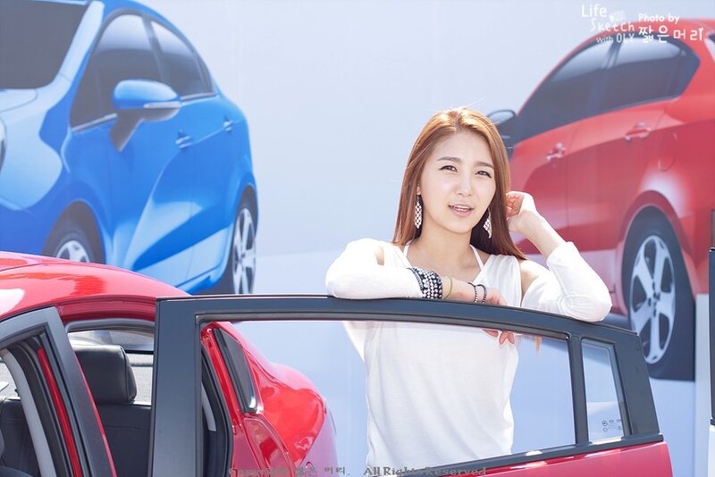 woman at car show event