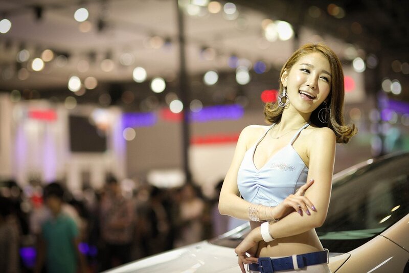Woman at car show event