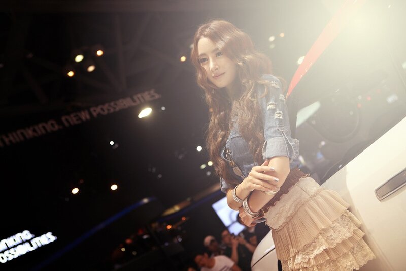woman at car show event