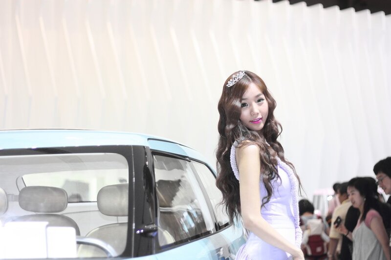 woman at car show event