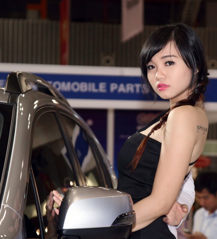 Woman at car show event