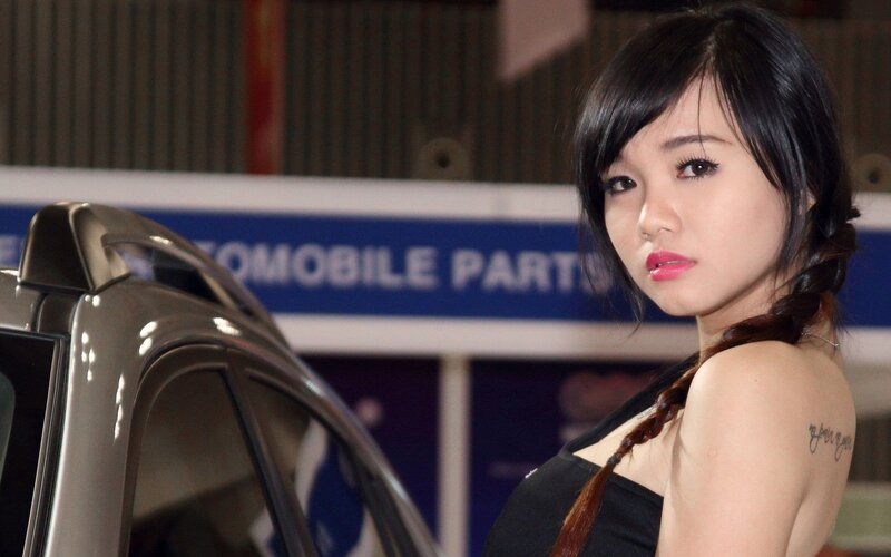 woman at car show event