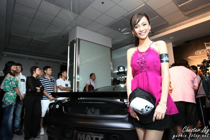 Woman at car show event