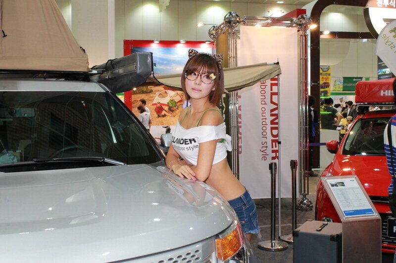 Woman at Car Show — White, Neutral, Afternoon, Photograph