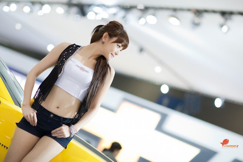 Woman at Car Show — Yellow, Neutral, Photograph