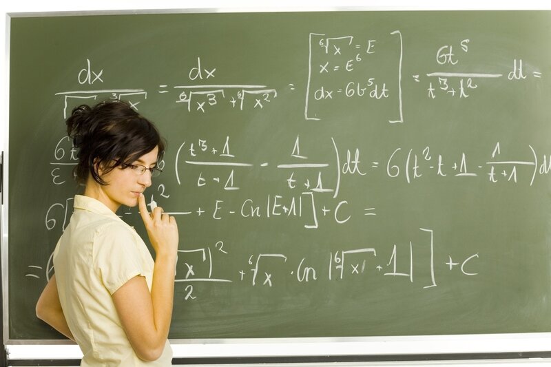Woman at Chalkboard