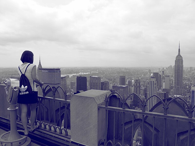 Woman at city viewpoint