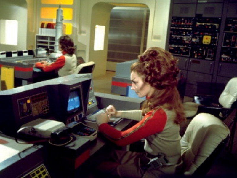 Woman at Control Panel — White