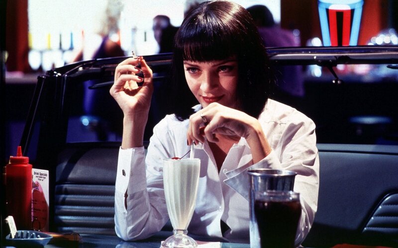 Woman at diner with milkshake