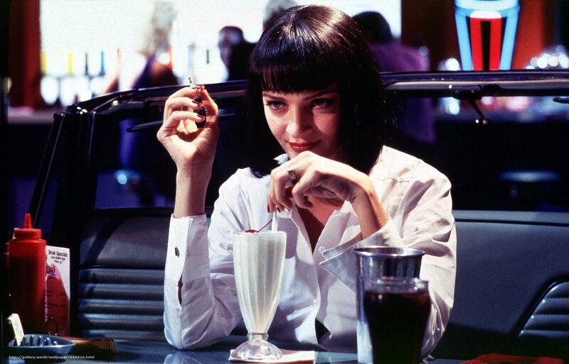 Woman at diner with milkshake
