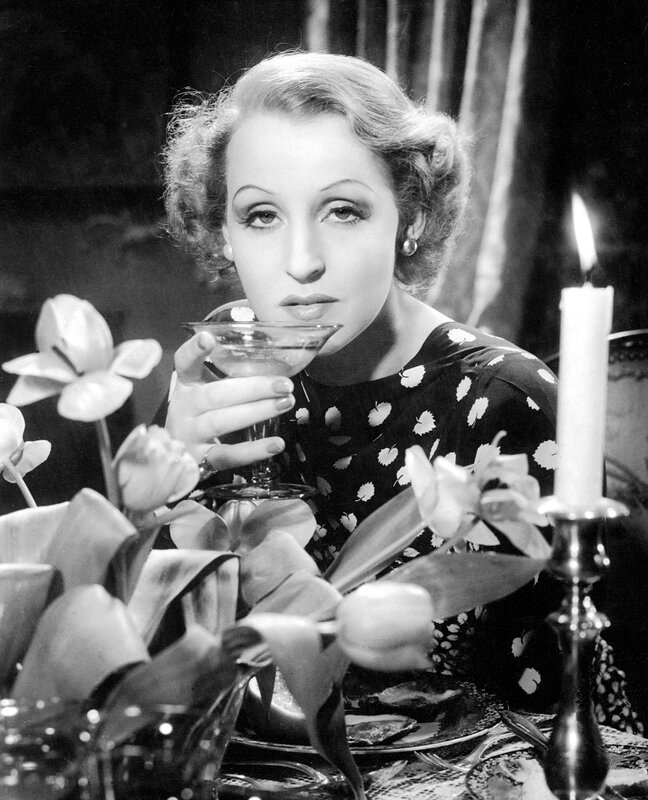 Woman at dinner with cocktail