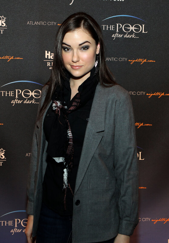 woman at event in blazer