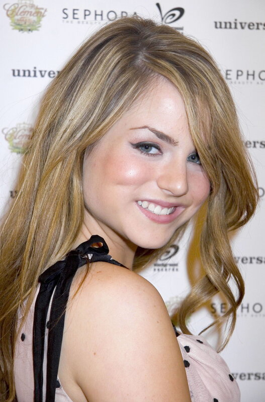 woman at event smiling
