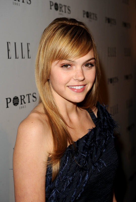 woman at event smiling