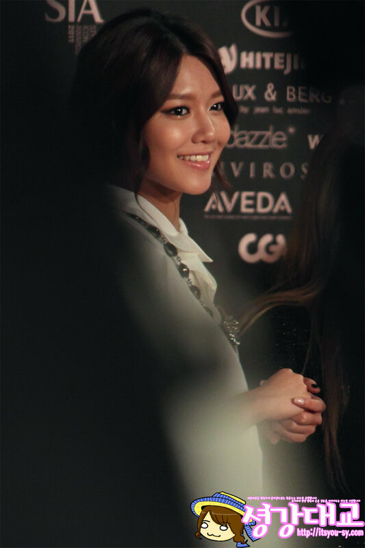 woman at event smiling