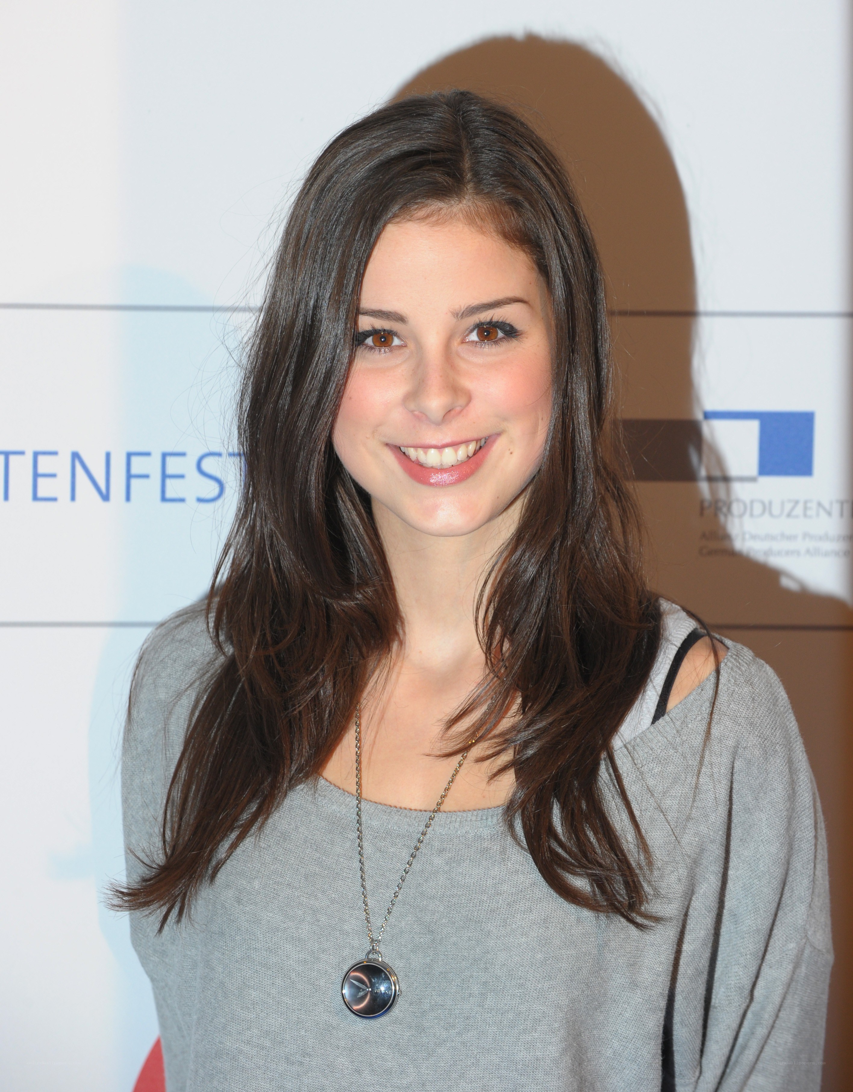 woman at event smiling