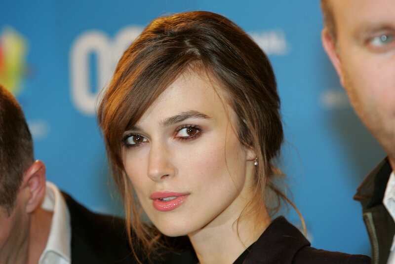 woman at event with blue background