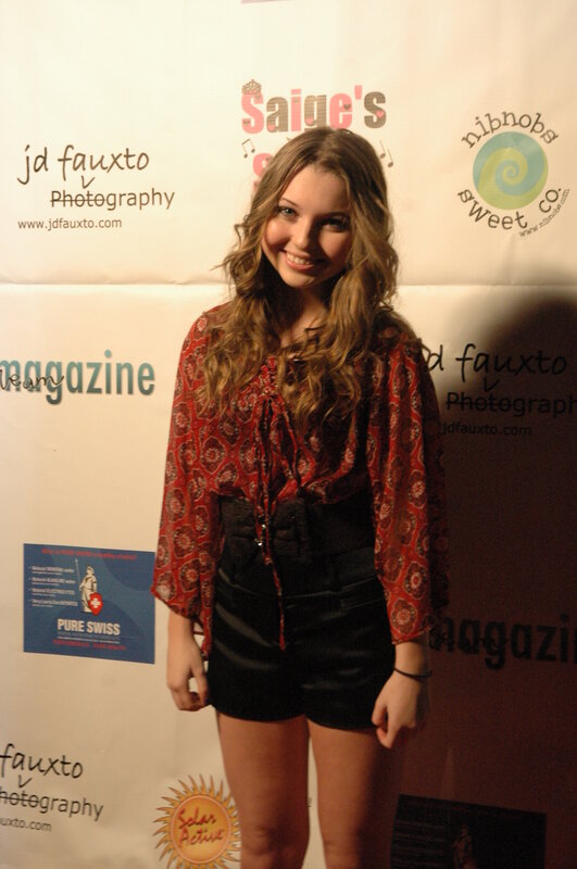 woman at event with logos