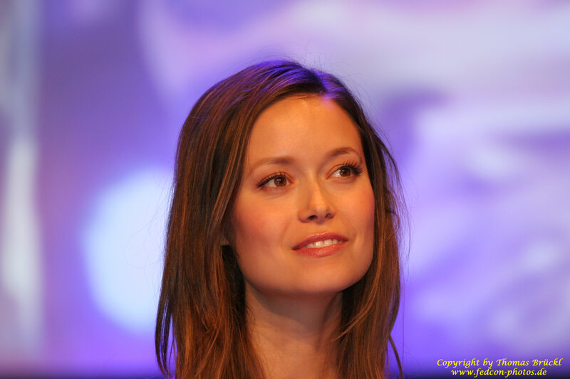 woman at event with purple lighting