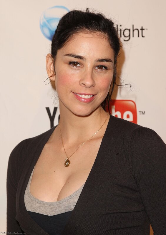 woman at event with youtube backdrop