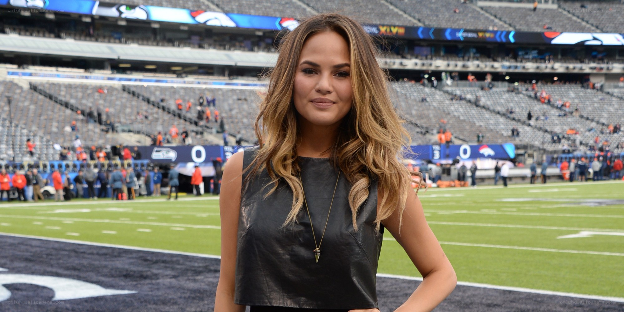 Woman at football stadium