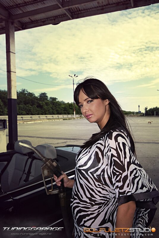 woman at gas station with car