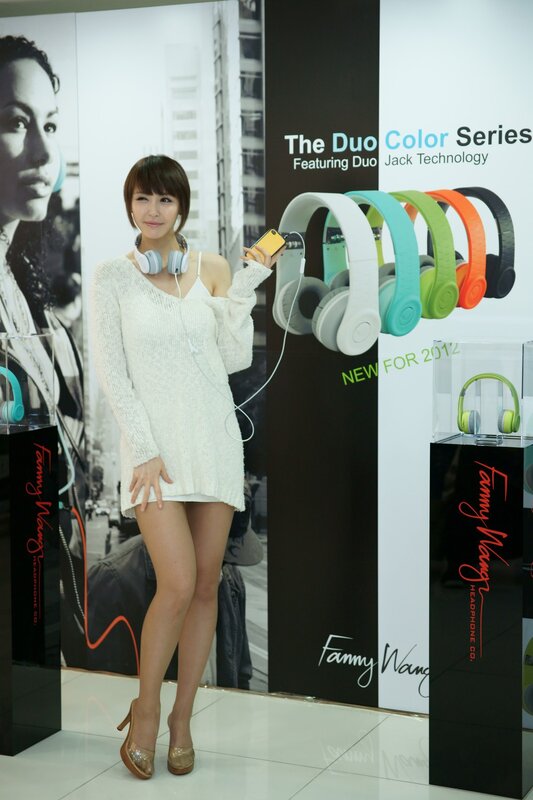 woman at headphone event