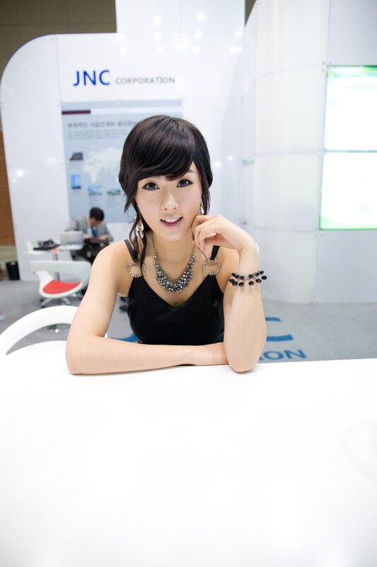Woman at JNC Corporation booth