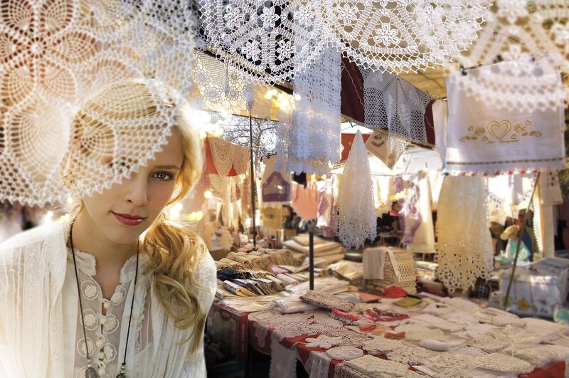 Woman at lace market stall