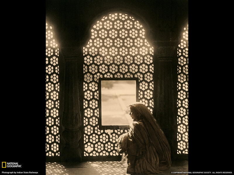 Woman at Latticed Window
