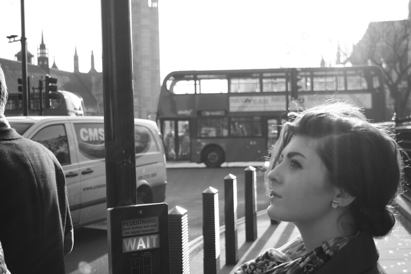 Woman at London bus stop