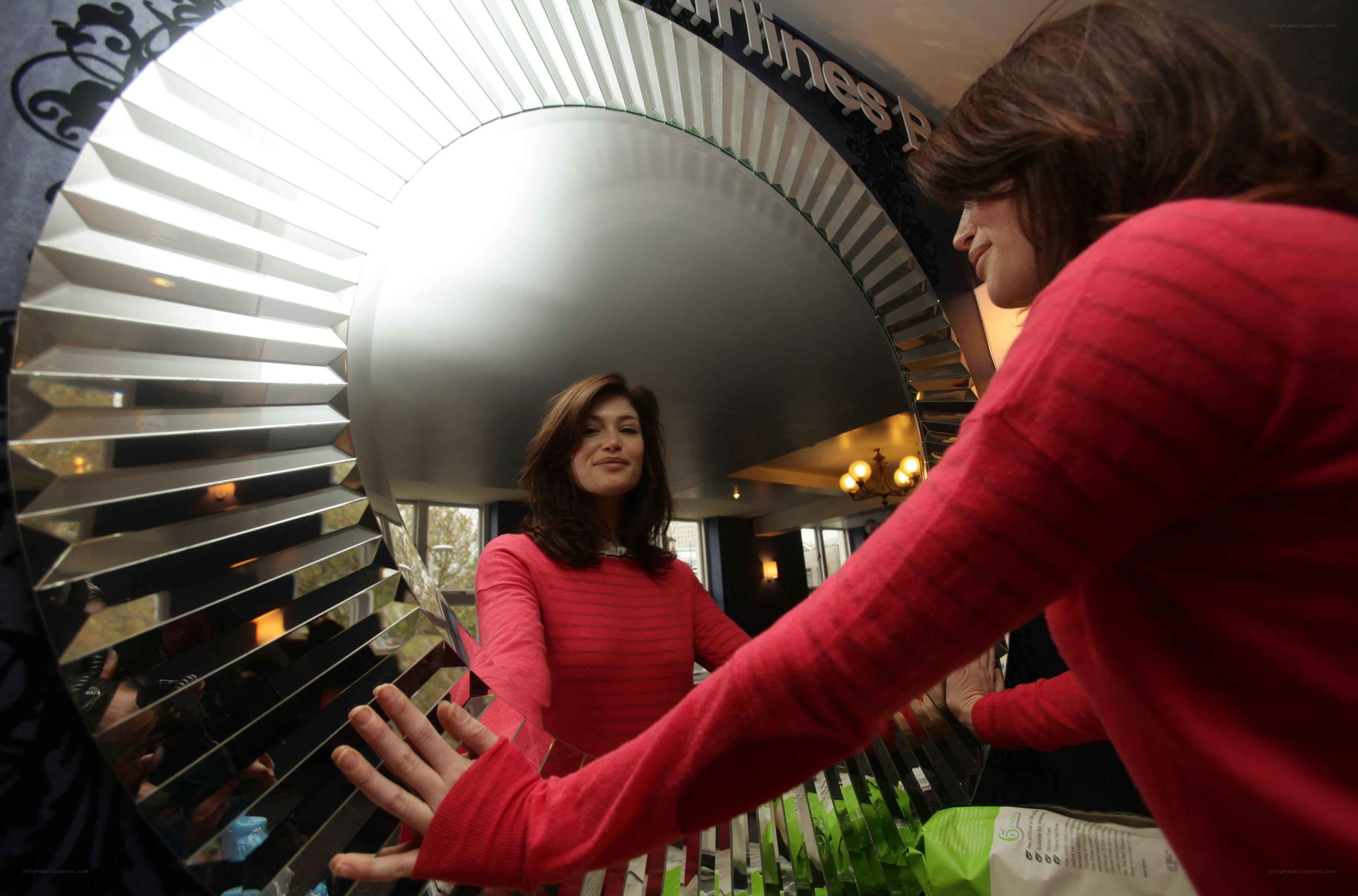 Woman at mirrored installation
