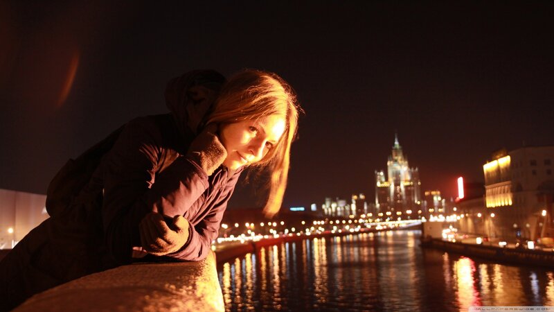 woman at night by the river